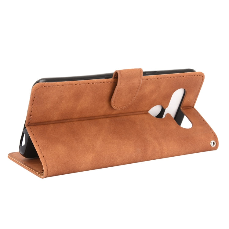 For LG K41S / K51S Solid Color Skin Feel Magnetic Buckle Horizontal Flip Calf Texture PU Leather Case with Holder & Card Slots & Wallet