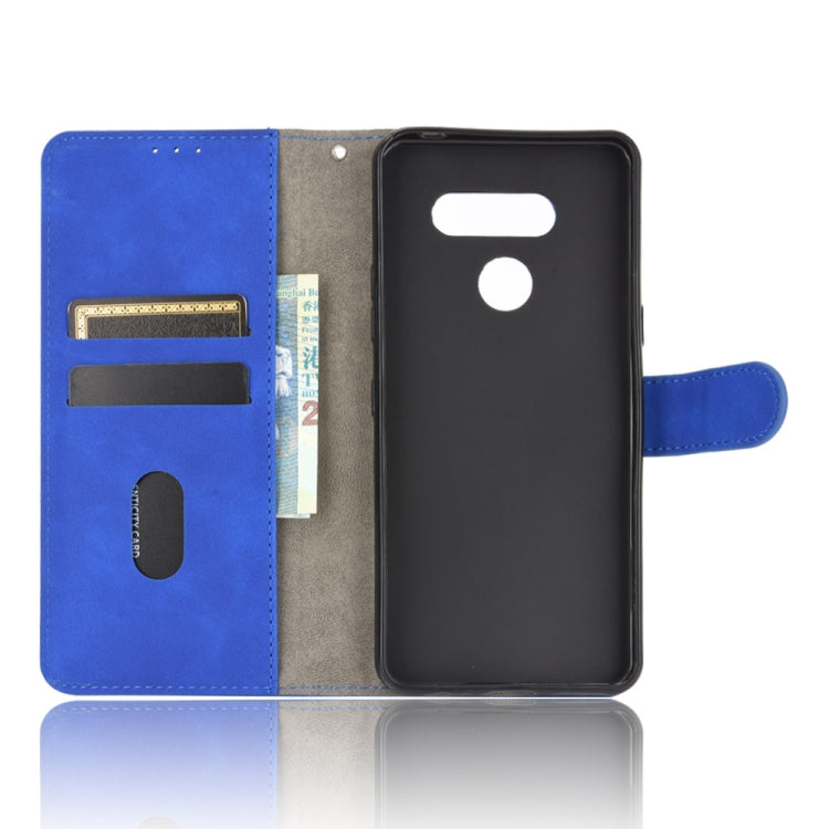 For LG K50S Solid Color Skin Feel Magnetic Buckle Horizontal Flip Calf Texture PU Leather Case with Holder & Card Slots & Wallet