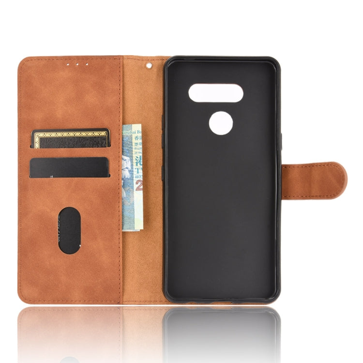 For LG K50S Solid Color Skin Feel Magnetic Buckle Horizontal Flip Calf Texture PU Leather Case with Holder & Card Slots & Wallet
