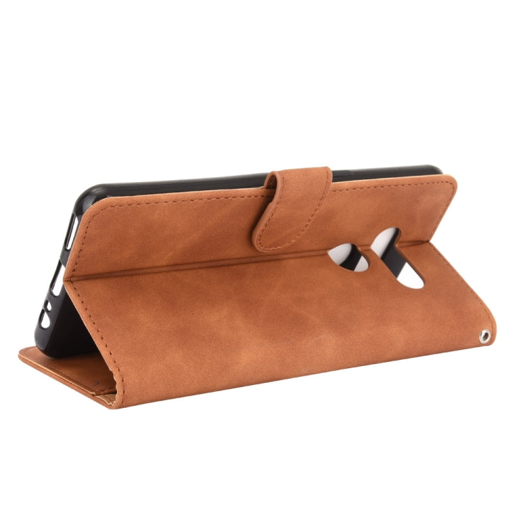 For LG K50S Solid Color Skin Feel Magnetic Buckle Horizontal Flip Calf Texture PU Leather Case with Holder & Card Slots & Wallet