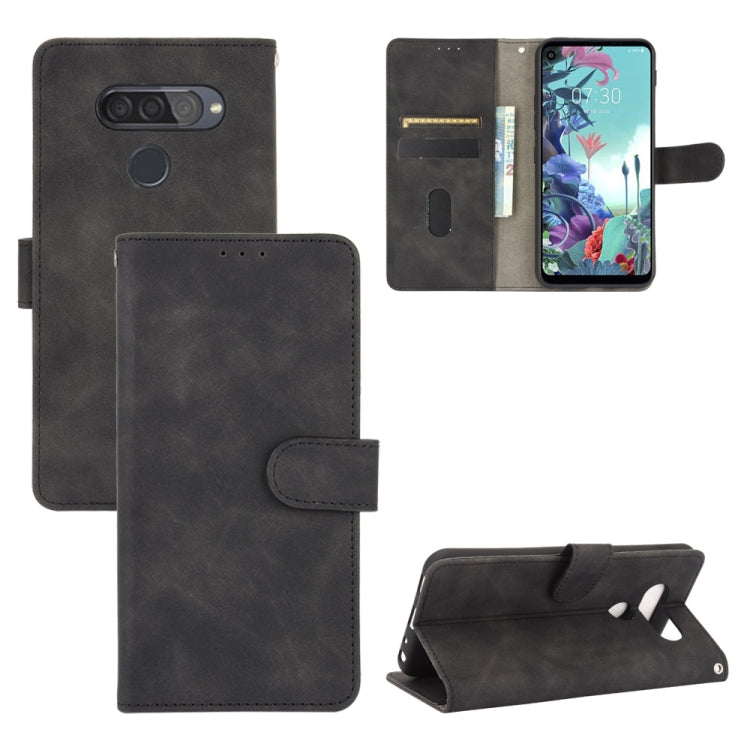 For LG Q70 Solid Color Skin Feel Magnetic Buckle Horizontal Flip Calf Texture PU Leather Case with Holder & Card Slots & Wallet