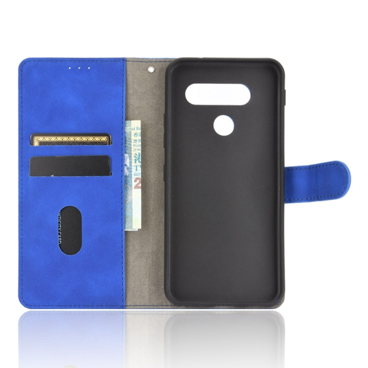 For LG Q70 Solid Color Skin Feel Magnetic Buckle Horizontal Flip Calf Texture PU Leather Case with Holder & Card Slots & Wallet