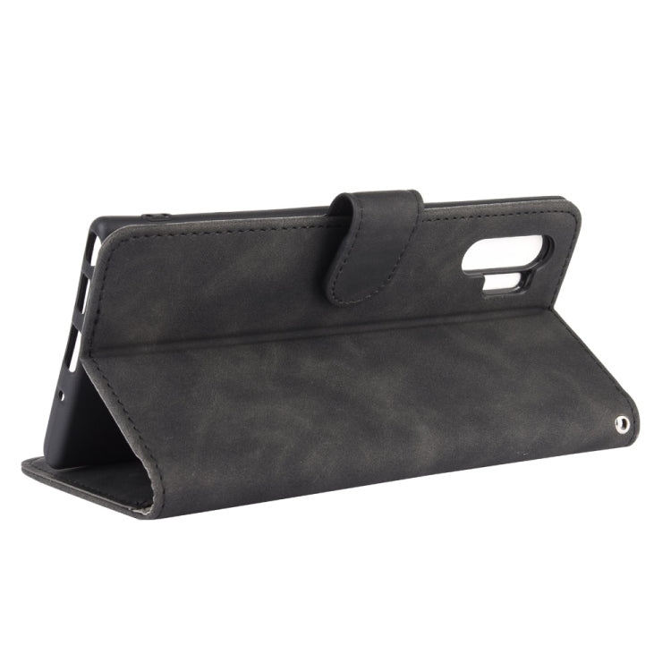 For Samsung Galaxy Note10 Plus Solid Color Skin Feel Magnetic Buckle Horizontal Flip Calf Texture PU Leather Case with Holder & Card Slots & Wallet