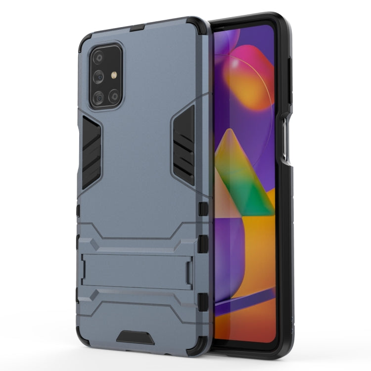 For Samsung Galaxy M31s PC + TPU Shockproof Protective Case with Invisible Holder