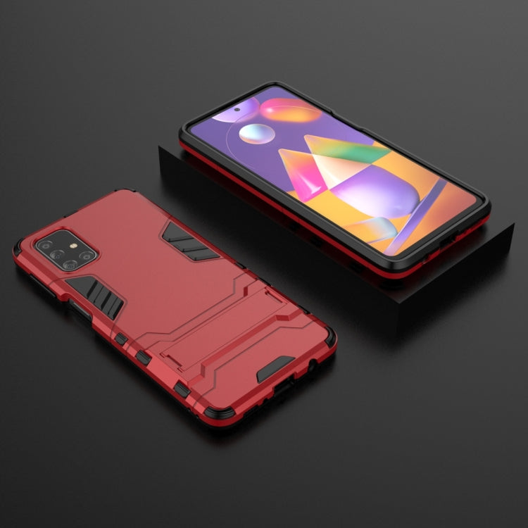For Samsung Galaxy M31s PC + TPU Shockproof Protective Case with Invisible Holder