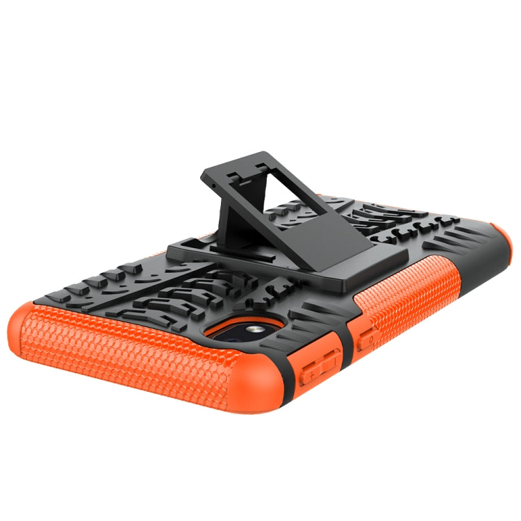 For Samsung Galaxy A01 Core Tire Texture Shockproof TPU + PC Protective Case with Holder