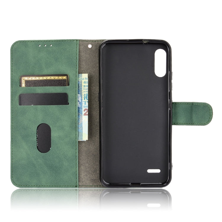 For LG K22 Solid Color Skin Feel Magnetic Buckle Horizontal Flip Calf Texture PU Leather Case with Holder & Card Slots & Wallet