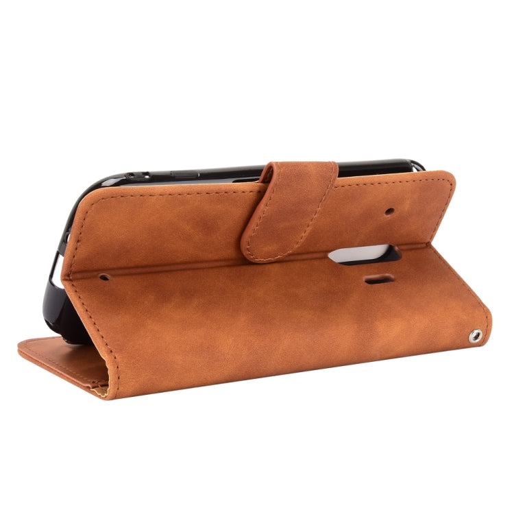 For Fujitsu F-42A / F-01L Solid Color Skin Feel Magnetic Buckle Horizontal Flip Calf Texture PU Leather Case with Holder & Card Slots & Wallet