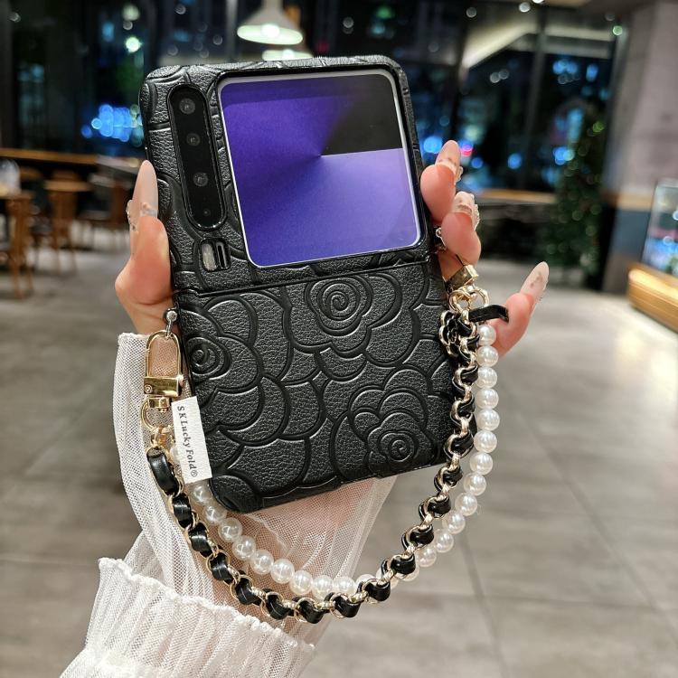 For Huawei Pura X Side Buckle Embossed Camellia Phone Case with Bracelet