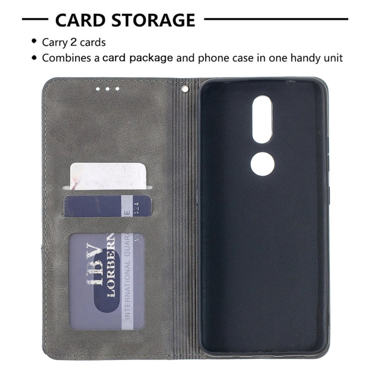 For Nokia 2.4 Rhombus Texture Horizontal Flip Magnetic Leather Case with Holder & Card Slots
