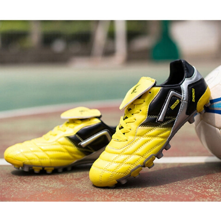 Zhenzu Outdoor Sporting Professional Training PU AG Nail Football Shoes, EU Size: 40(Yellow)