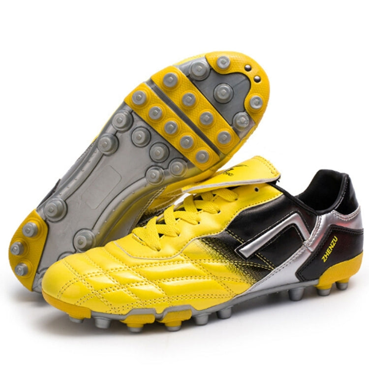 Zhenzu Outdoor Sporting Professional Training PU AG Nail Football Shoes, EU Size: 41(Yellow)