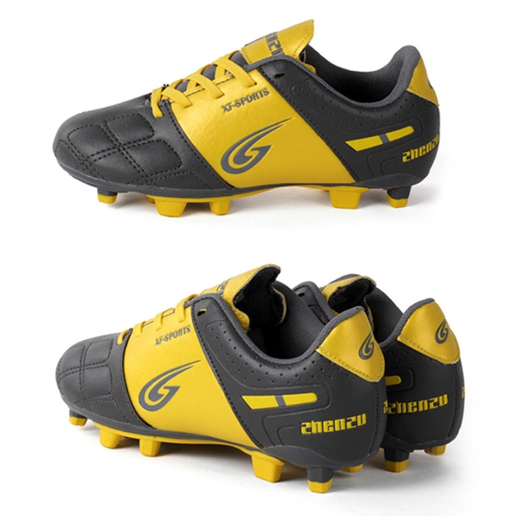 Zhenzu Outdoor Sporting Professional Training PU Children Football Shoes, EU Size: 29(Yellow)