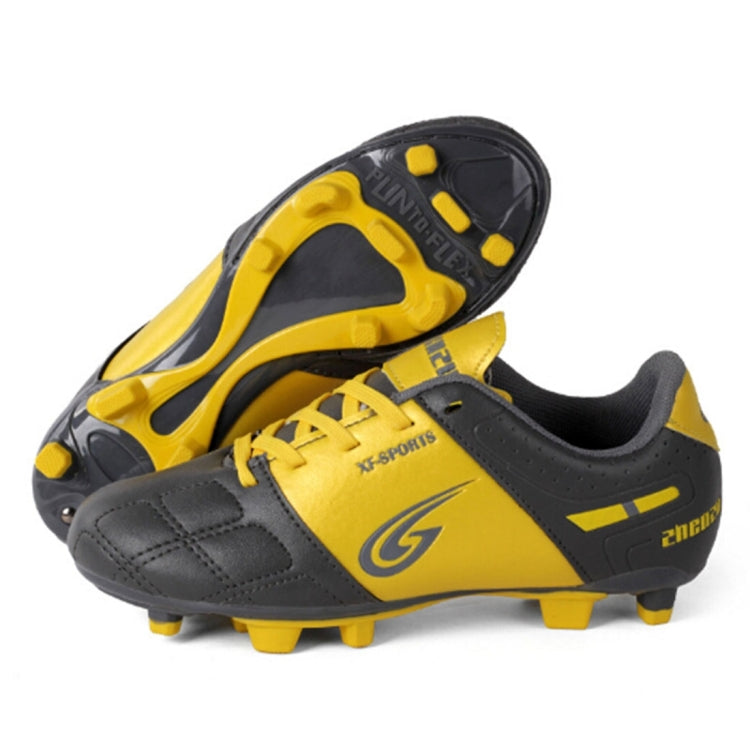 Zhenzu Outdoor Sporting Professional Training PU Children Football Shoes, EU Size: 37(Yellow)