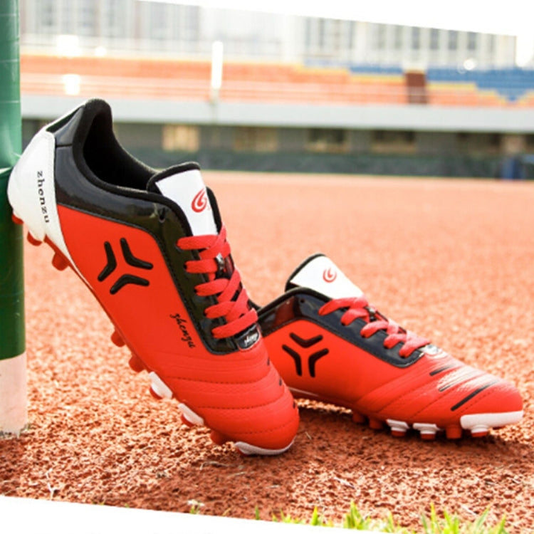 Zhenzu Outdoor Sporting Professional Training PU Short Nail Football Shoes, EU Size: 39(Red)