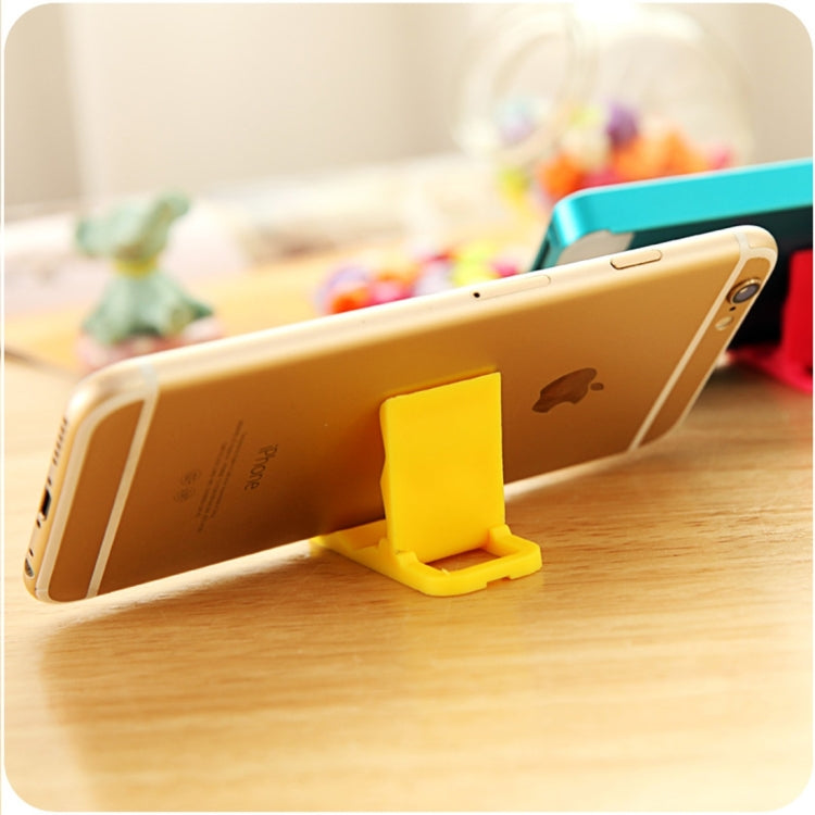 100 PCS Universal Foldable Adjustable L-shape Plastic Desktop Phone Holder Stand for Mobile Phones and Tablets, Size: 4.6 x 1.9 cm, Random Color Delivery