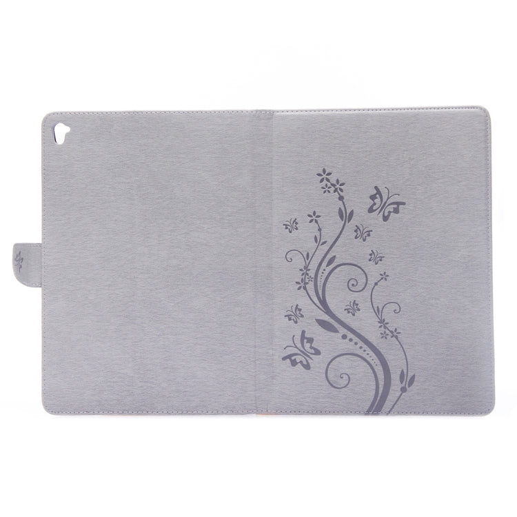 For iPad Pro 9.7inch Pressed Flowers Butterfly Pattern Horizontal Flip PU Leather Case with Magnetic Buckle & Holder & Card Slots & Wallet