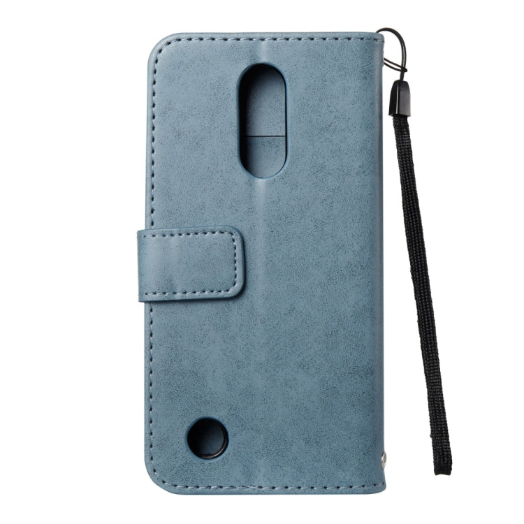 For LG K8 (2017) (US Version) Skull Pressed Flowers Pattern Horizontal Flip Leather Case with Holder & Card Slots & Wallet & Lanyard