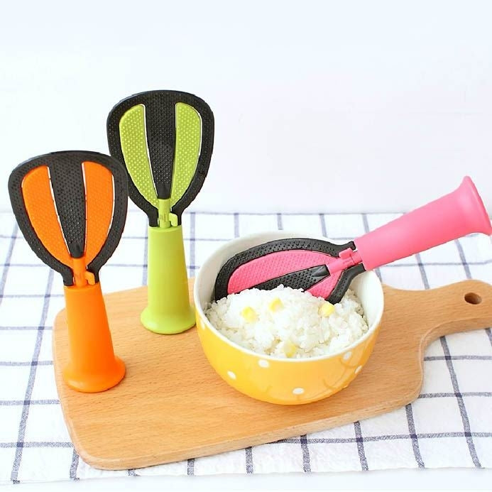 Multifunctional Rotatable Nonstick Standing Rice Scoop and Egg Beater (Ramdon Color Delivery)