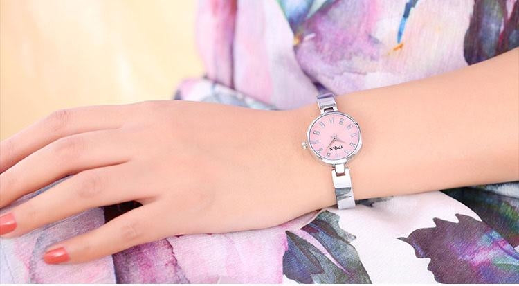 YAQIN Rhinestone & Roman Number Small Simple Round Dial Women Quartz Watch with Alloy Band(White)
