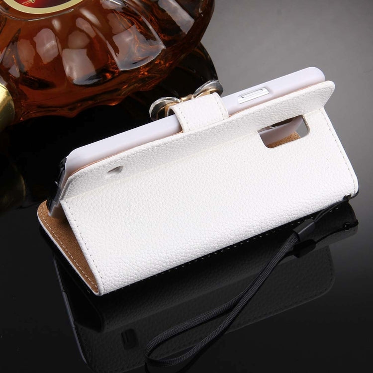 For Galaxy S5 / G900 Diamond Encrusted Bowknot Pattern Horizontal Flip Leather Case with Magnetic Buckle & Card Slots & Holder & Lanyard
