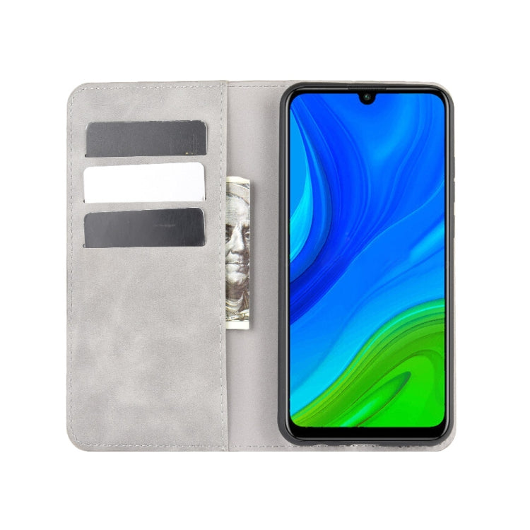 For Huawei P smart 2020 Retro-skin Business Magnetic Suction Leather Case with Holder & Card Slots & Wallet