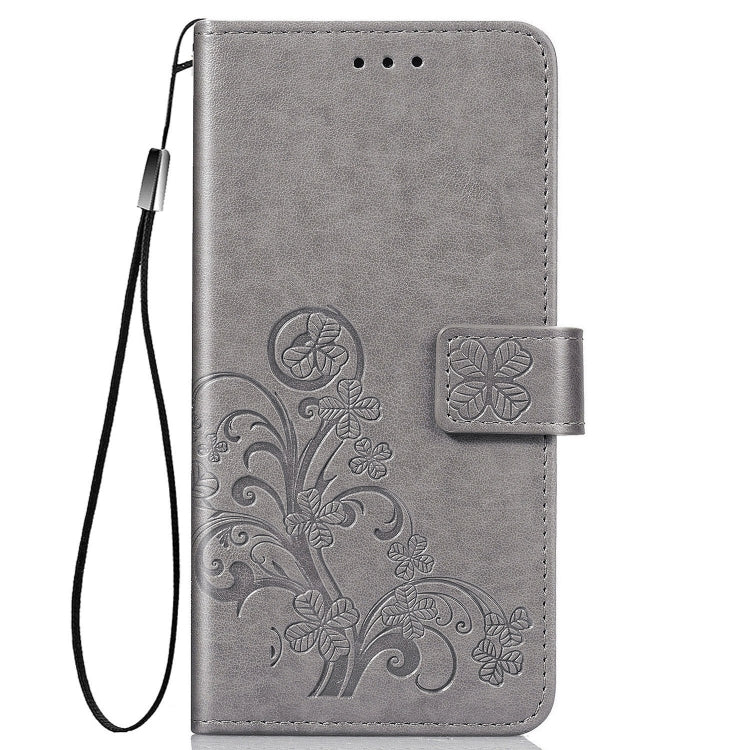 For Samsung Galaxy A21s Four-leaf Clasp Embossed Buckle Mobile Phone Protection Leather Case with Lanyard & Card Slot & Wallet & Bracket Function