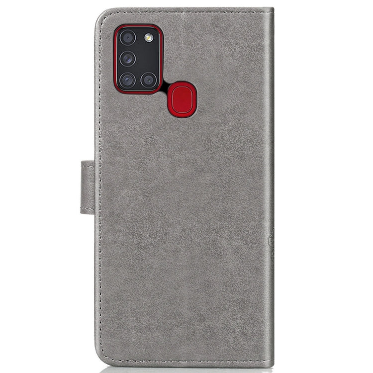 For Samsung Galaxy A21s Four-leaf Clasp Embossed Buckle Mobile Phone Protection Leather Case with Lanyard & Card Slot & Wallet & Bracket Function