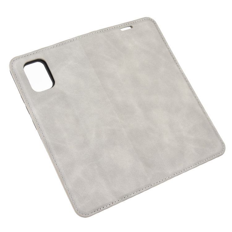 For ZTE Axon 11 Retro-skin Business Magnetic Suction Leather Case with Holder & Card Slots & Wallet