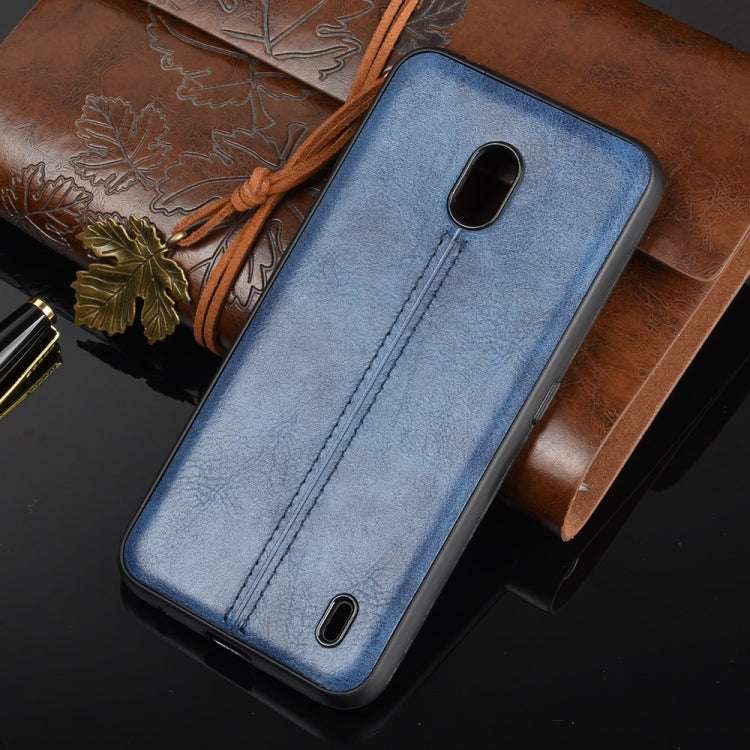 For Nokia 2.2 Shockproof Sewing Cow Pattern Skin PC + PU + TPU Case