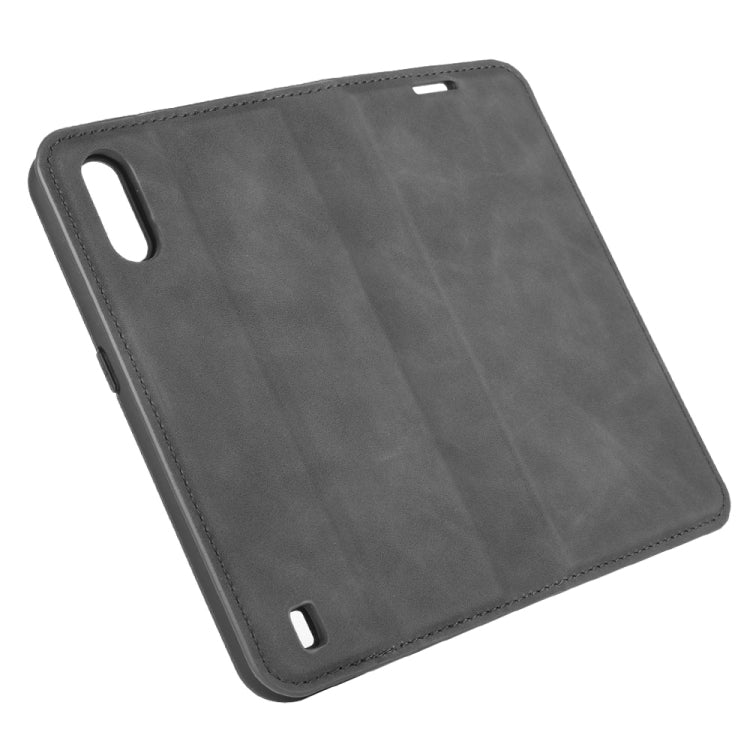 For Samsung Galaxy M01 Retro-skin Business Magnetic Suction Leather Case with Holder & Card Slots & Wallet
