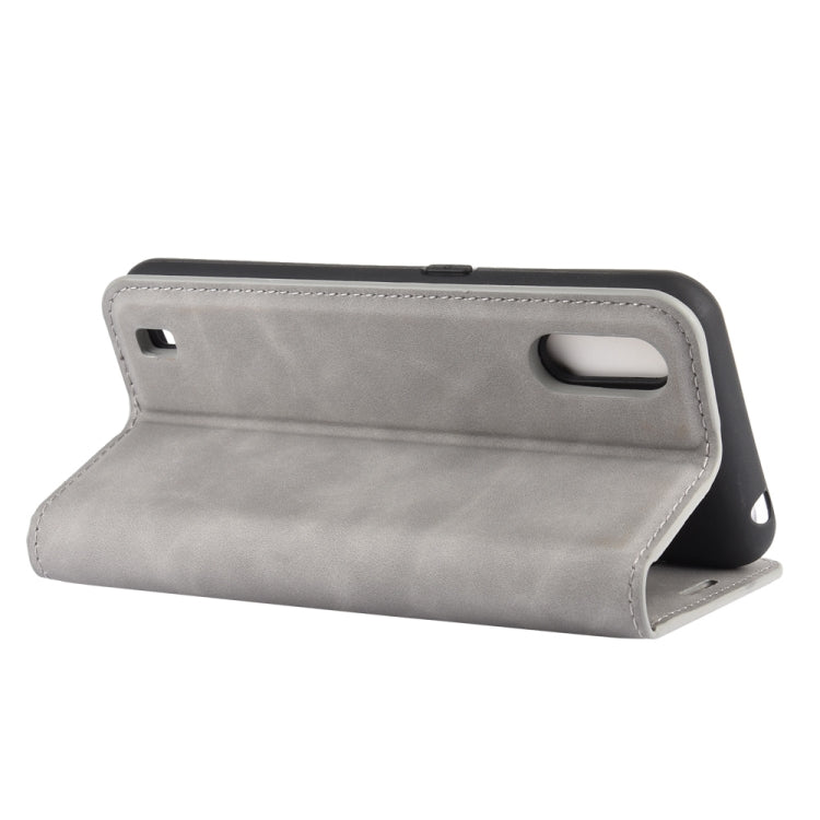 For Samsung Galaxy M01 Retro-skin Business Magnetic Suction Leather Case with Holder & Card Slots & Wallet