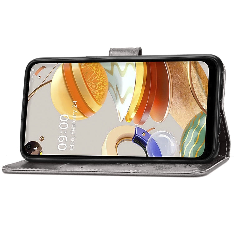 For LG K61 Four-leaf Clasp Embossed Buckle Mobile Phone Protection Leather Case with Lanyard & Card Slot & Wallet & Bracket Function