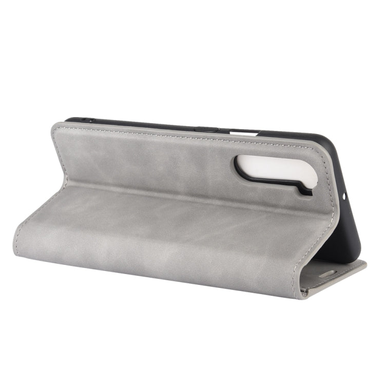 For OnePlus Nord Retro-skin Business Magnetic Suction Leather Case with Holder & Card Slots & Wallet