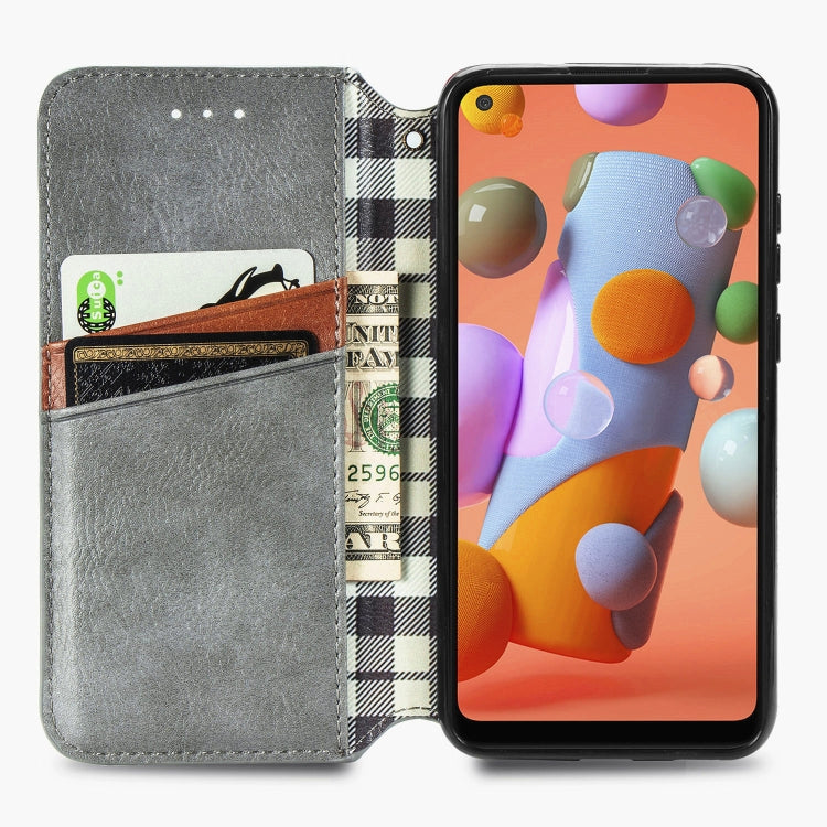 For Samsung Galaxy A11/M11 Cubic Grid Pressed Horizontal Flip Magnetic Leather Case with Holder & Card Slots & Wallet
