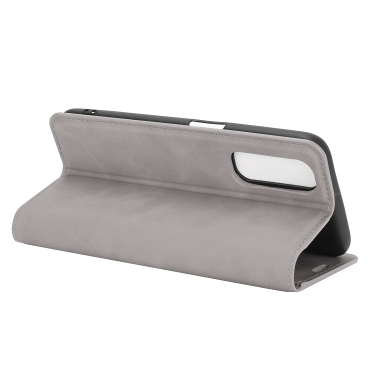 For OPPO Realme 7 Retro-skin Business Magnetic Suction Leather Case with Holder & Card Slots & Wallet