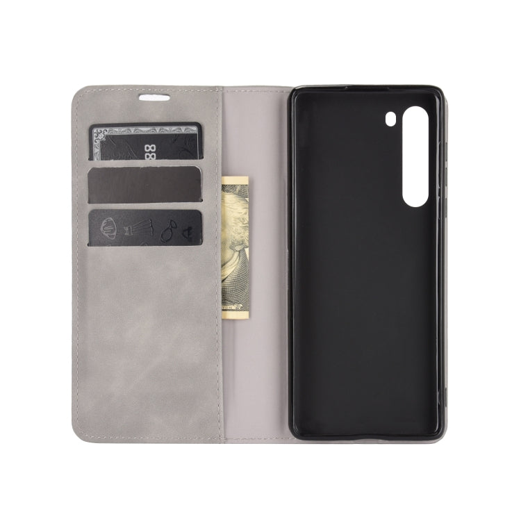 For Motorola Moto Edge Retro-skin Business Magnetic Suction Leather Case with Holder & Card Slots & Wallet