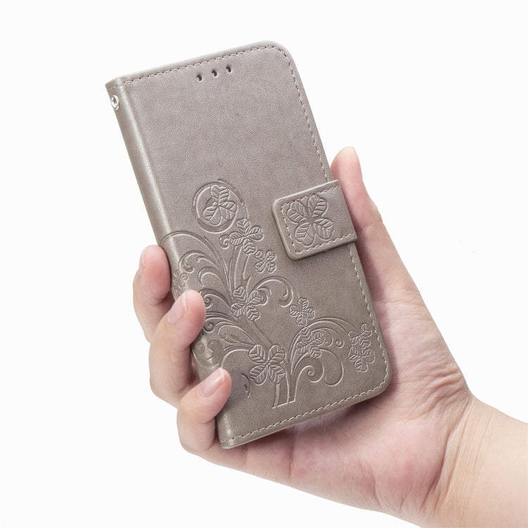 Four-leaf Clasp Embossed Buckle Mobile Phone Protection Leather Case with Lanyard & Card Slot & Wallet & Bracket Function For Samsung Galaxy A32 5G