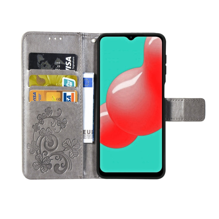 Four-leaf Clasp Embossed Buckle Mobile Phone Protection Leather Case with Lanyard & Card Slot & Wallet & Bracket Function For Samsung Galaxy A32 5G