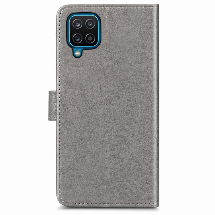 Four-leaf Clasp Embossed Buckle Mobile Phone Protection Leather Case with Lanyard & Card Slot & Wallet & Bracket Function For Samsung Galaxy A12