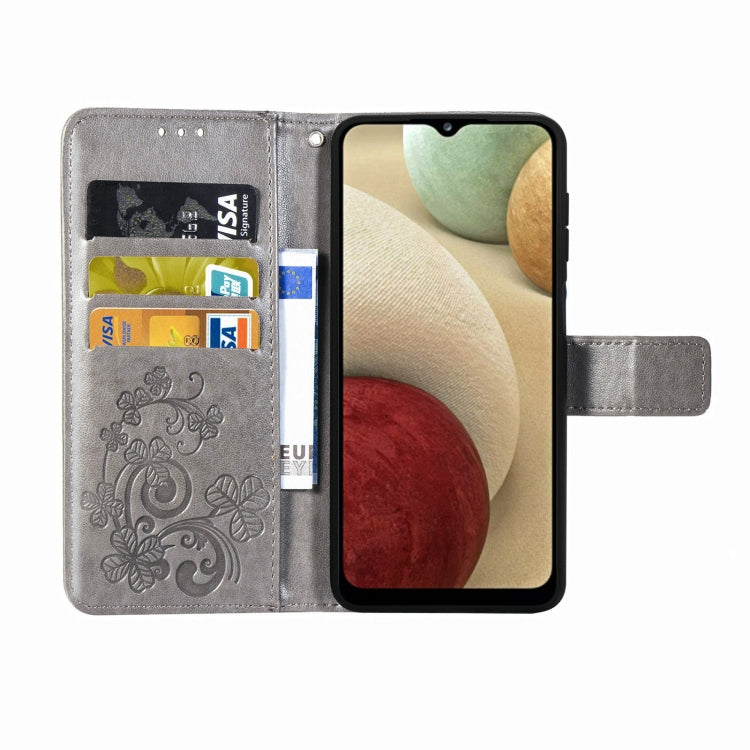 Four-leaf Clasp Embossed Buckle Mobile Phone Protection Leather Case with Lanyard & Card Slot & Wallet & Bracket Function For Samsung Galaxy A12