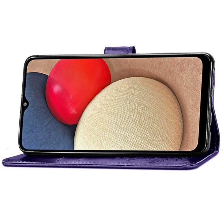 For Samsung Galaxy A02s (EU Version) Four-leaf Clasp Embossed Buckle Mobile Phone Protection Leather Case with Lanyard & Card Slot & Wallet & Bracket Function