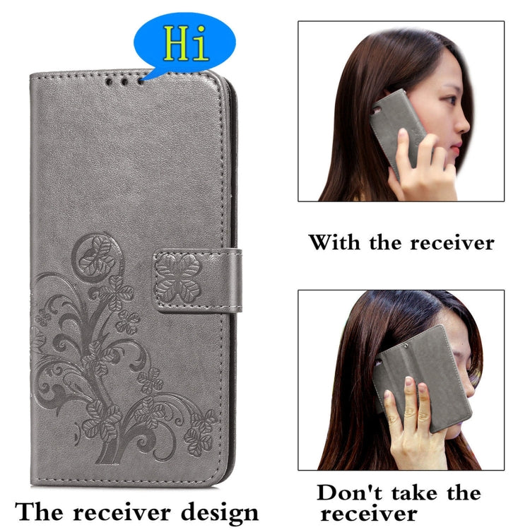 For Samsung Galaxy A02s (EU Version) Four-leaf Clasp Embossed Buckle Mobile Phone Protection Leather Case with Lanyard & Card Slot & Wallet & Bracket Function