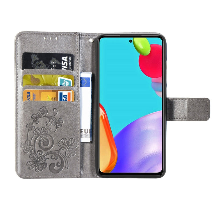 For Samsung Galaxy A72 5G / 4G Four-leaf Clasp Embossed Buckle Mobile Phone Protection Leather Case with Lanyard & Card Slot & Wallet & Bracket Function