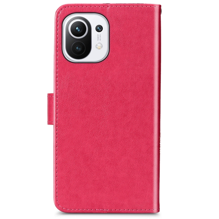For Xiaomi Mi 11 Four-leaf Clasp Embossed Buckle Mobile Phone Protection Leather Case with Lanyard & Card Slot & Wallet & Bracket Function