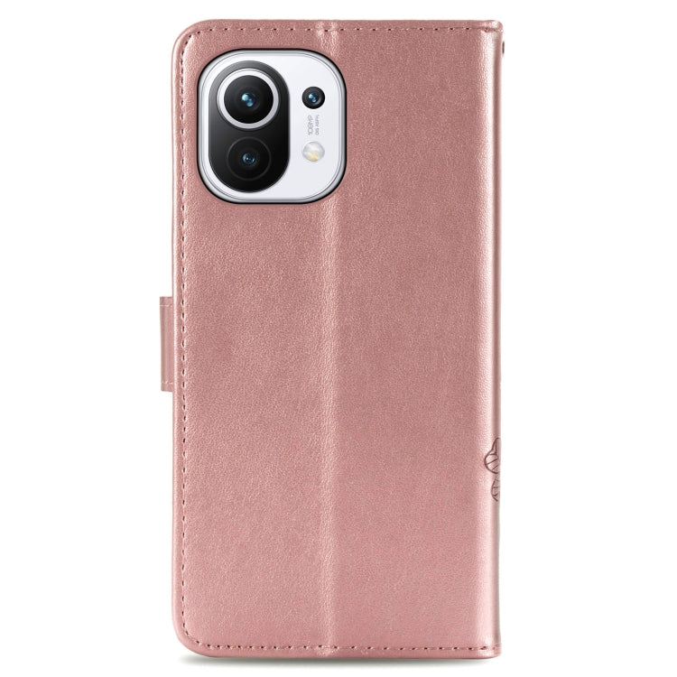 For Xiaomi Mi 11 Four-leaf Clasp Embossed Buckle Mobile Phone Protection Leather Case with Lanyard & Card Slot & Wallet & Bracket Function