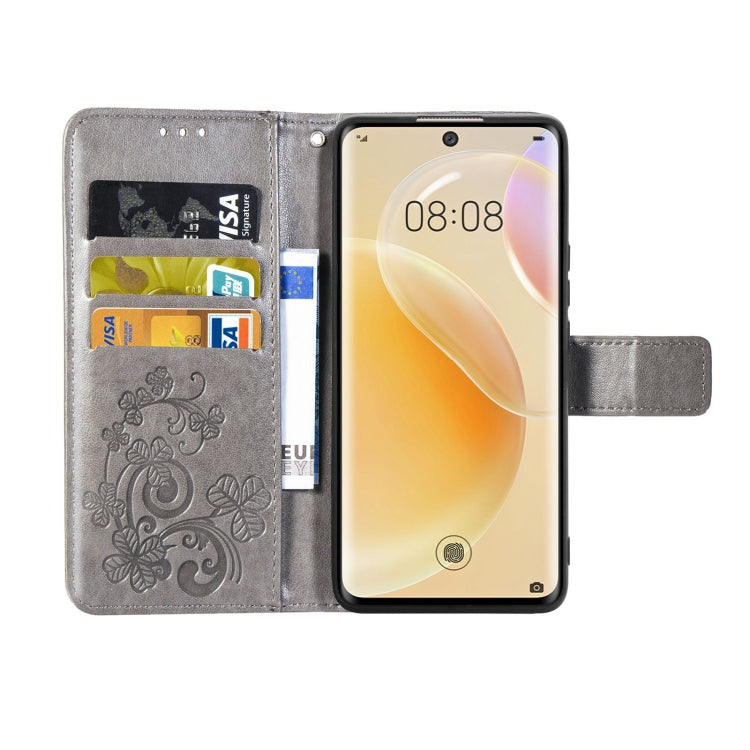 For Huawei  Nova 8  Four-leaf Clasp Embossed Buckle Mobile Phone Protection Leather Case with Lanyard & Card Slot & Wallet & Bracket Function