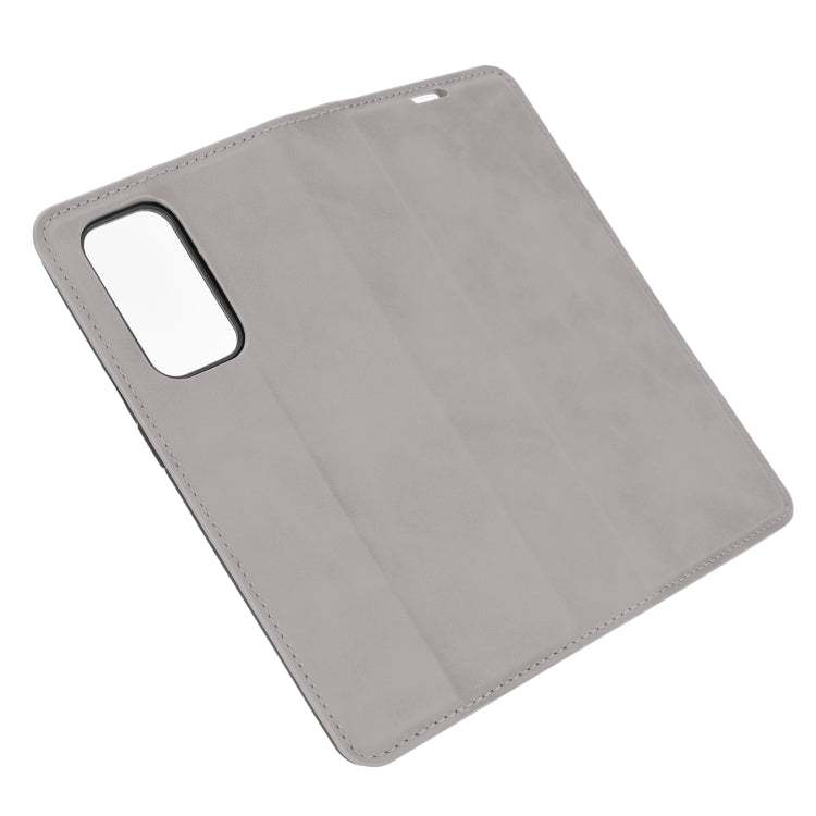 For OnePlus 9 Retro-skin Business Magnetic Suction Leather Case with Holder & Card Slots & Wallet