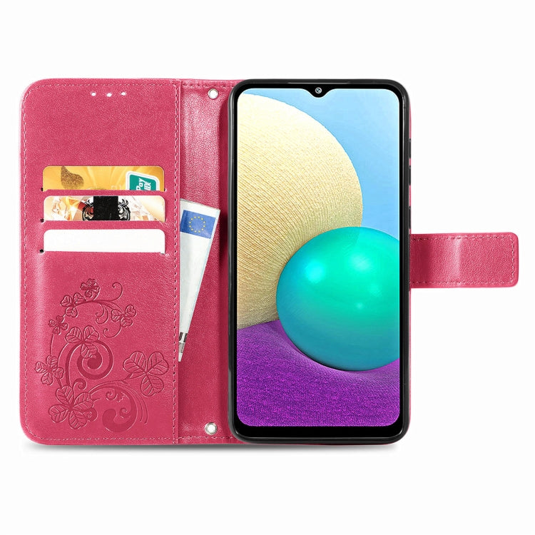 For Samsung Galaxy A02 Four-leaf Clasp Embossed Buckle Mobile Phone Protection Leather Case with Lanyard & Card Slot & Wallet & Bracket Function