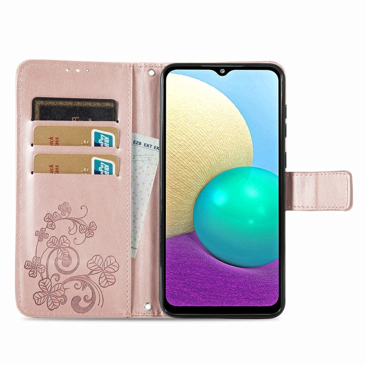 For Samsung Galaxy A02 Four-leaf Clasp Embossed Buckle Mobile Phone Protection Leather Case with Lanyard & Card Slot & Wallet & Bracket Function